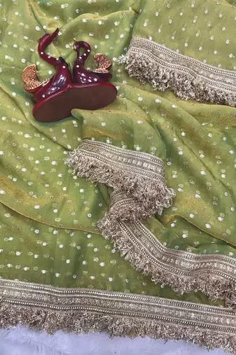 green fancy lace border with jaquard butti silk saree