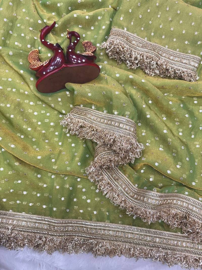 green fancy lace border with jaquard butti silk saree