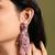 Mauve stone jhumka long earrings