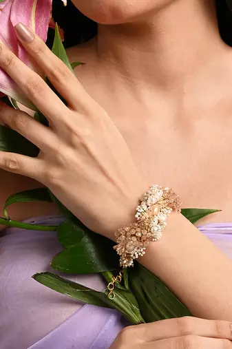 Gold plated pearl peach stone floral bracelet