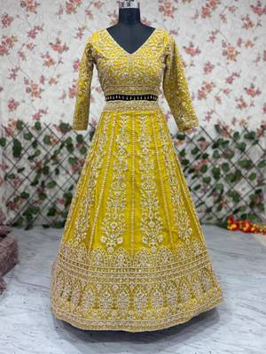 yellow net embroidered lehenga choli 2