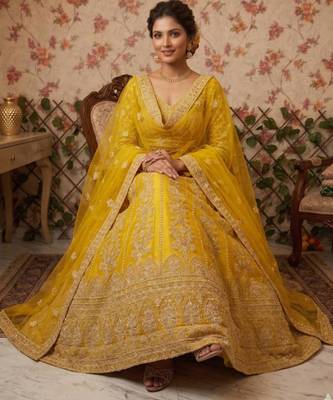 yellow net embroidered lehenga choli 3
