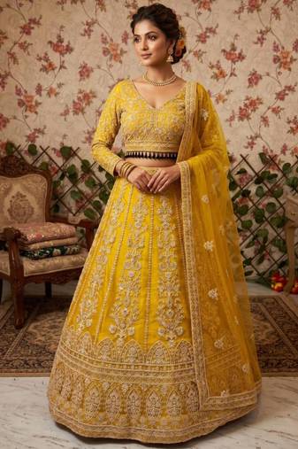 yellow net embroidered lehenga choli