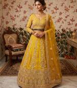 yellow net embroidered lehenga choli