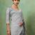 Grey georgette geometrical printed saree with unstitched blouse