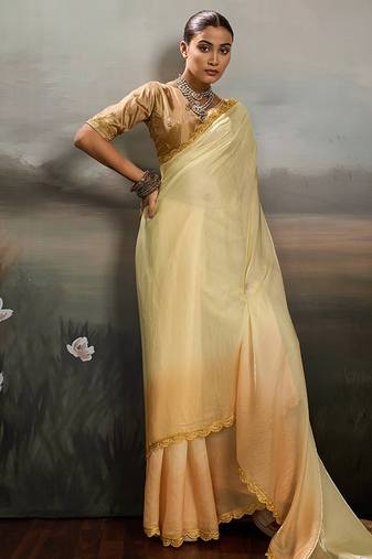 Yellow satin plain dyed saree with unstitched blouse
