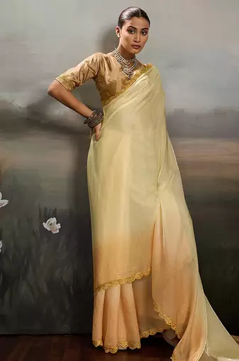 Yellow satin plain dyed saree with unstitched blouse