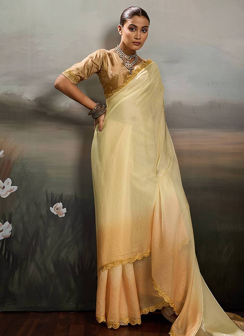 Yellow satin plain dyed saree with unstitched blouse