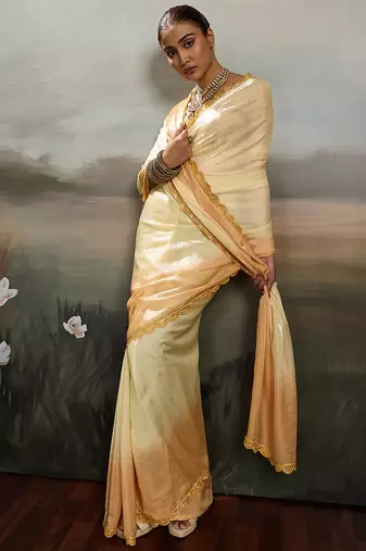 Yellow satin plain dyed saree with unstitched blouse