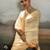 Yellow satin plain dyed saree with unstitched blouse