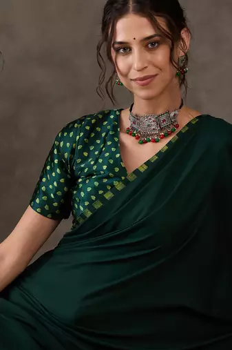 Green color Pre Pleated semi modal saree with unstitched designer blouse