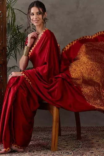 red pre draped semi modal saree with designer blouse