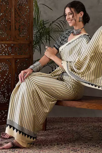 Cream color Pre Pleated semi modal saree with unstitched designer blouse
