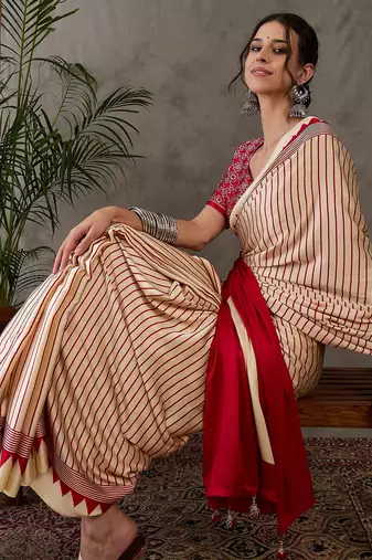 Cream color Pre Pleated semi modal saree with unstitched designer blouse