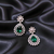 Green Stone AD Studded Dangler Earrings