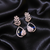Blue Stone AD Flower Motif Dangler Earrings
