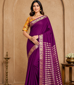plum embroidery with printed zari jaqurad border georgette saree