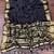 black jaqurad border and zari chit pallu khaddi crep georgette sareewith tassels 