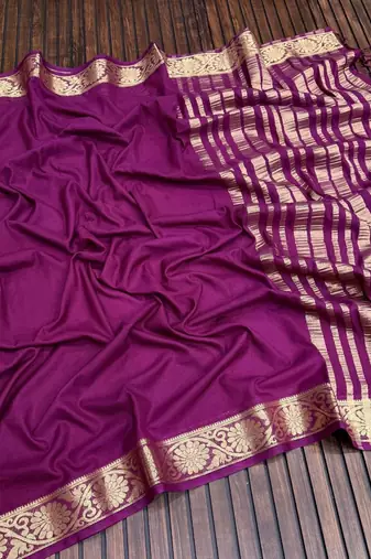 plum jaqurad border and zari chit pallu khaddi crep georgette sareewith tassels 