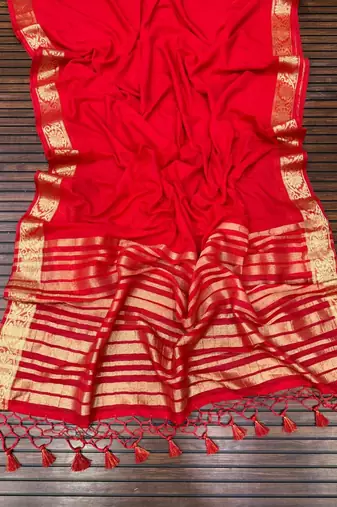red jaqurad border and zari chit pallu khaddi crep georgette sareewith tassels 