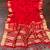 red jaqurad border and zari chit pallu khaddi crep georgette sareewith tassels 