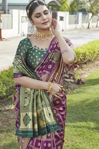 Wine woven jacquard art  banarasi silk  saree with blouse piece.