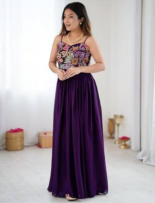 Elegant wine georgette gown featuring multicolor floral embroidered bodice and flowing full-length flared design 1
