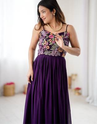 Elegant wine georgette gown featuring multicolor floral embroidered bodice and flowing full-length flared design 4