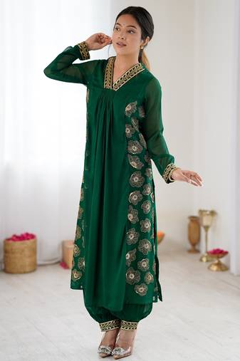 Elegant dark green georgette kurta set with floral embroidery and stylish balloon pants