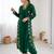 Elegant dark green georgette kurta set with floral embroidery and stylish balloon pants