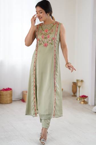 Elegant pista green georgette embroidered straight kurta with coordinated tapered pants set