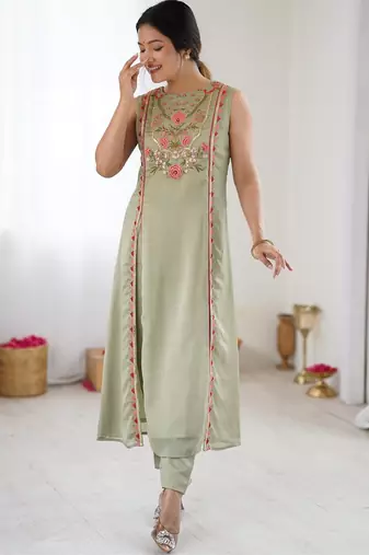 Elegant pista green georgette embroidered straight kurta with coordinated tapered pants set