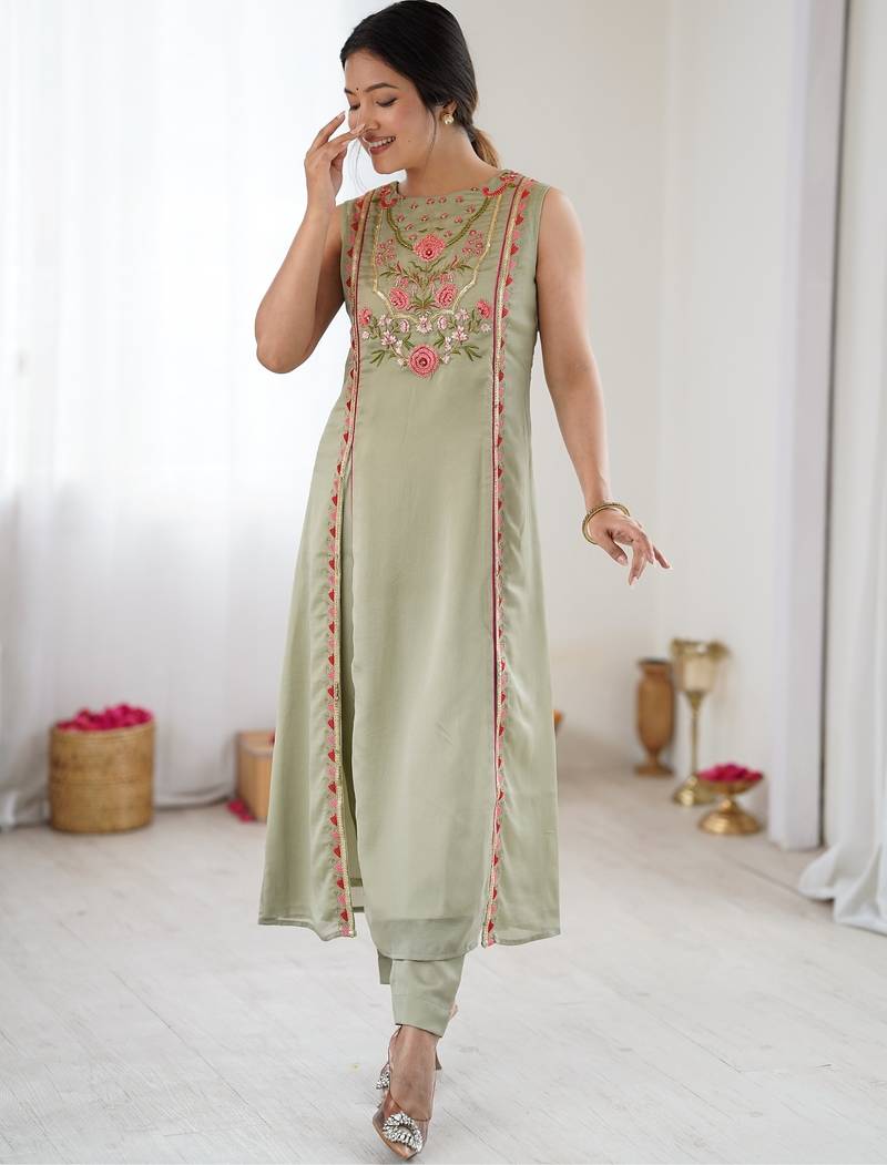 Elegant pista green georgette embroidered straight kurta with coordinated tapered pants set