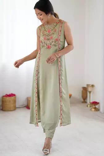 Elegant pista green georgette embroidered straight kurta with coordinated tapered pants set