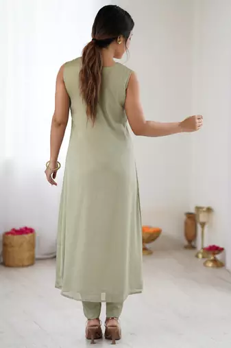 Elegant pista green georgette embroidered straight kurta with coordinated tapered pants set