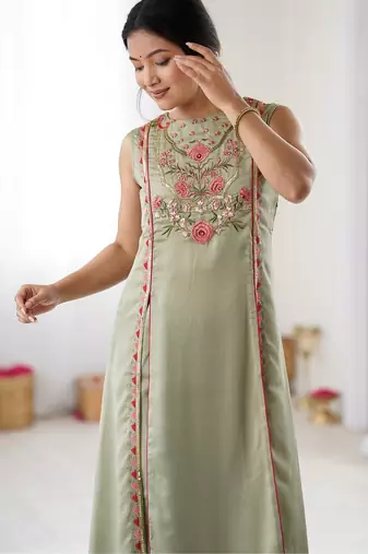 Elegant pista green georgette embroidered straight kurta with coordinated tapered pants set