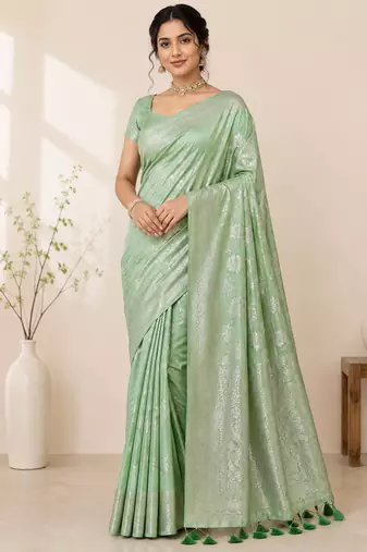 light green tassels on pallu a with border khaddi crep georgette saree