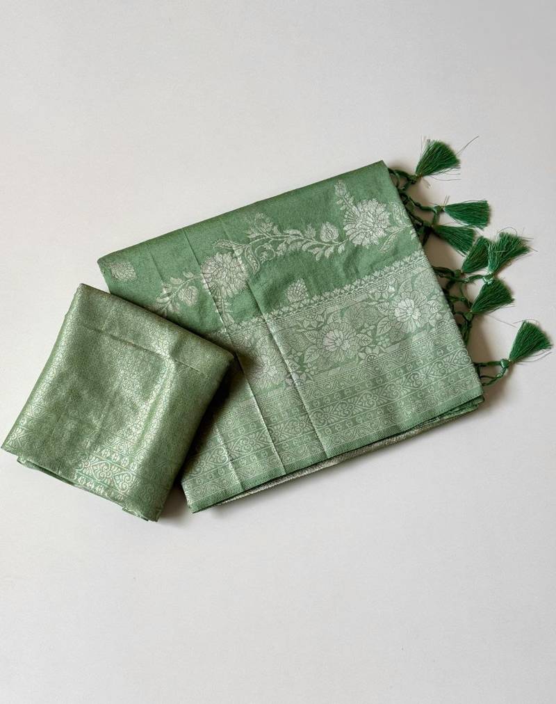 light green tassels on pallu a with border khaddi crep georgette saree