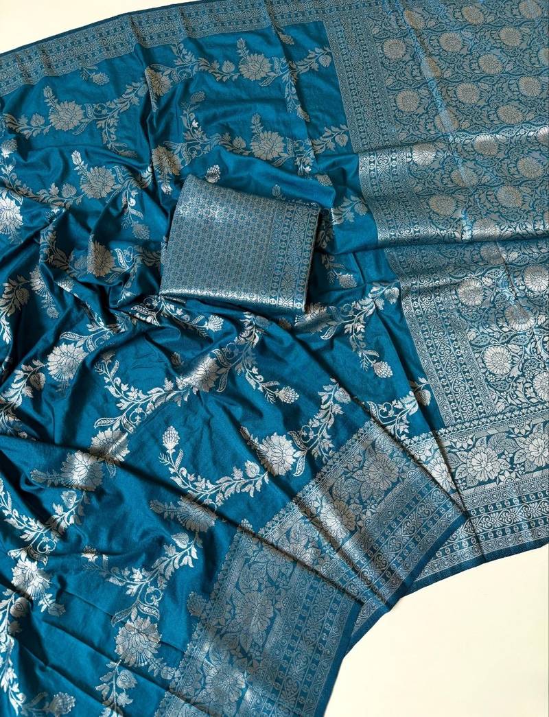 teal tassels on pallu a with border khaddi crep georgette saree