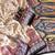 cream-black printed pasmina print with dori fitting silk jaqurad saree