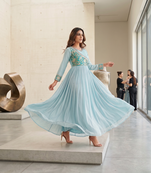 Sky blue color fancy gown in chinon with bandhani print and embroidery work