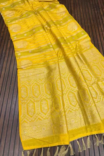 yellow jaqurad dubbling zari and beautiful peacock butti with lining design georgette saree