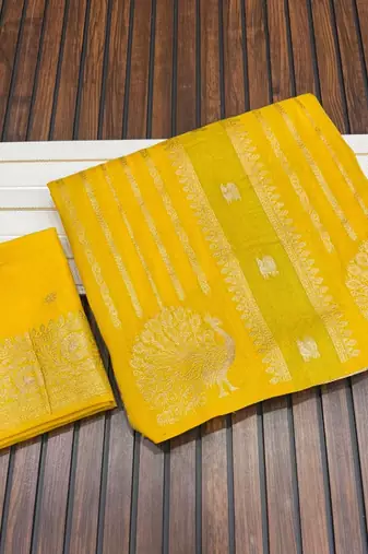 yellow jaqurad dubbling zari and beautiful peacock butti with lining design georgette saree