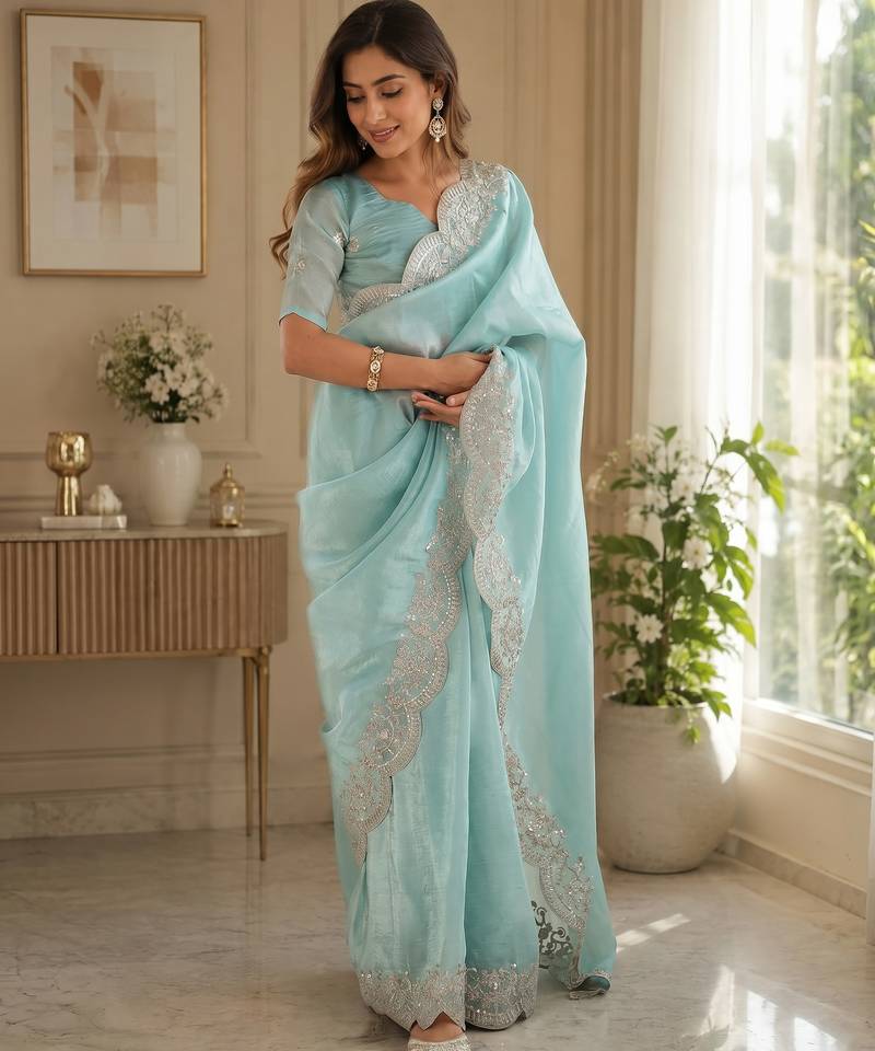 pastel blue shimmer chiffon plain embroidred border saree