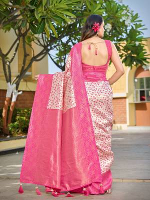 Banarasi satin blend saree floral zari woven saree with white color and pink border tassels with elegant look 2