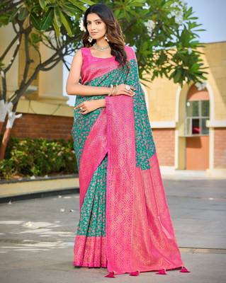 Banarasi satin silk saree floral zari woven saree with rama green and pink border tassels with elegant look 1