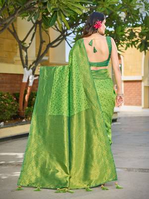 Banarasi satin silk saree floral zari woven saree with parrot green and green border tassel with elegance look 2
