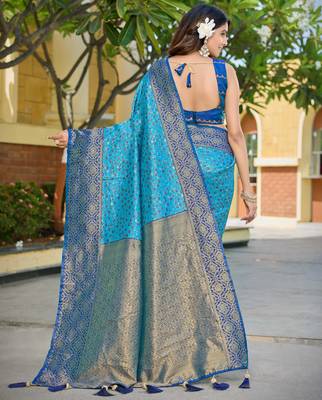 Banarasi satin silk saree floral zari woven saree with light and navi blue border tassels with elegance look 2