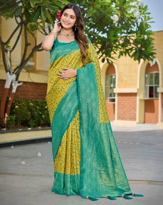 Banarasi satin silk saree floral zari woven saree with mustard color and turquoise blue border tassels 1