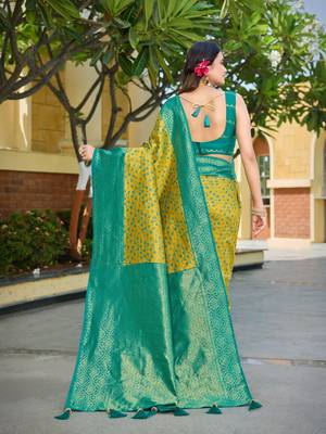 Banarasi satin silk saree floral zari woven saree with mustard color and turquoise blue border tassels 2